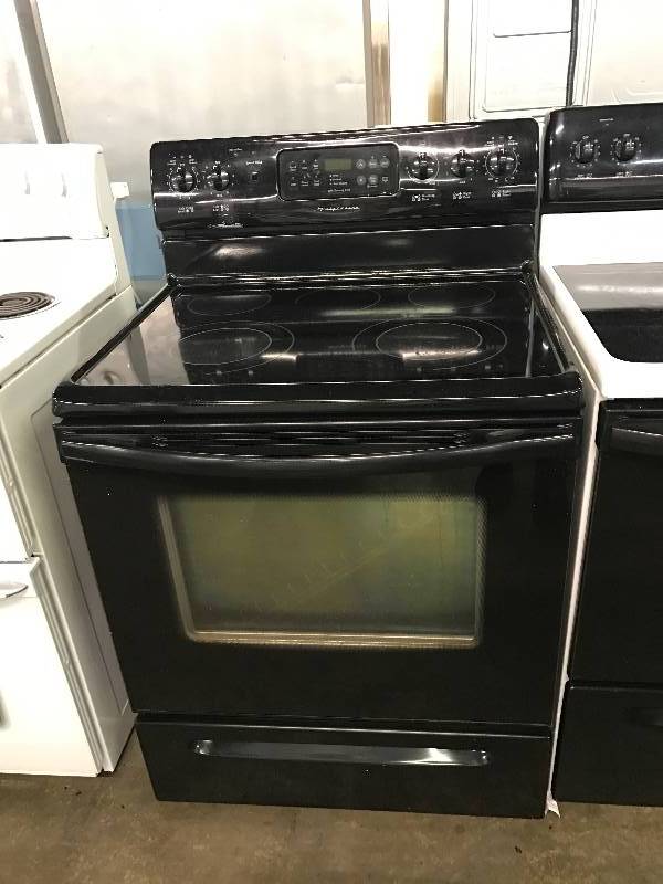 lot 1373 image: Frigidaire Black 5 Burner Electric Household Range Oven