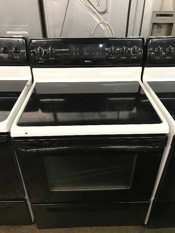 lot 1375 image: Kenmore Black & White Glass Top 4 Burner Range Oven