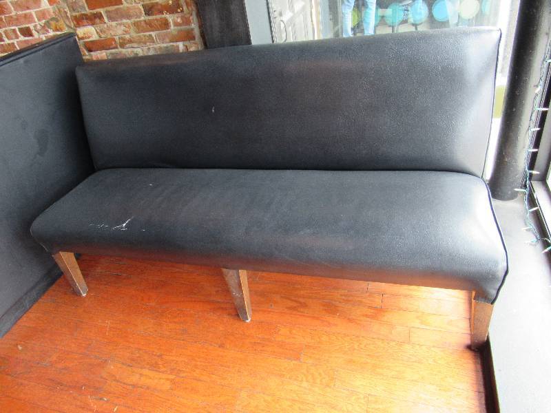 lot 1715 image: 74 Black Vinyl Padded Bench On Wooden Legs With Finished Backs