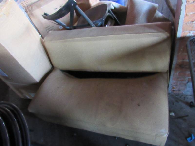 lot 1828 image: 48 Tan Vinyl Padded Armless Bench Seat
