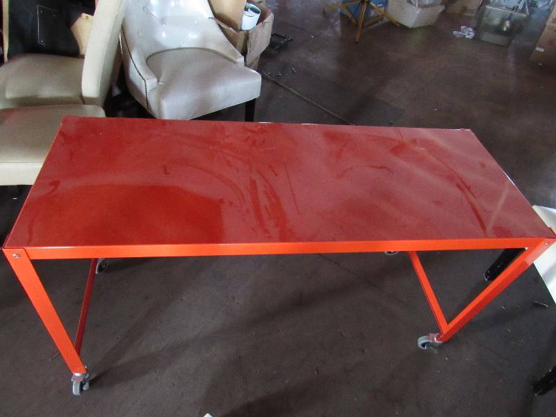 lot 1839 image: 55 Orange Powder Coated Rolling Desk