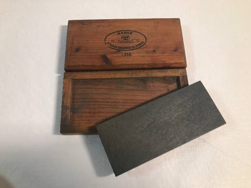 lot 2205 image: GENUINE KA-BAR Knive Sharpening Stone and 2 custom name Pictures - Cody & Colton