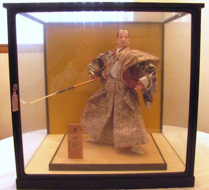 lot 7057 image: Oriental Figurine in Show Case - Very Collectible - Showcase Included