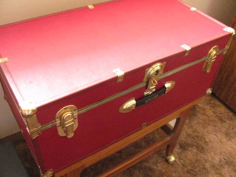lot 7103 image: Wooden Trunk - Red, buckles and latches