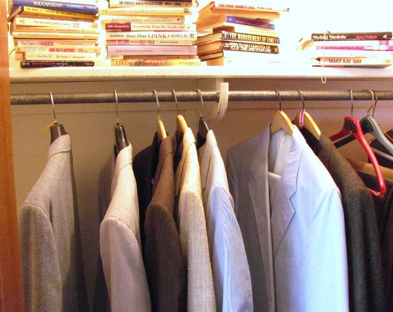 lot 7112 image: Contents of Closet - see photo Suits and books