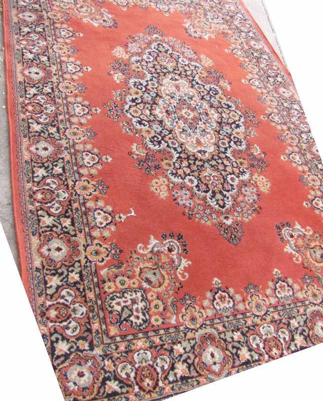 lot 7121 image: 2 decrative area rugs. One large. One small