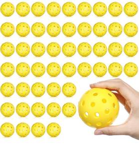 lot 55613 image: 50 Pcs 40 Holes Golf Practice Ball Hard Bounce Golf Training Ball Set High Elasticity Golf Hollow Ball Pure Yellow High Visibility Sports Balls Accessories for Outdoor Indoor Courts, 2.91 Inches