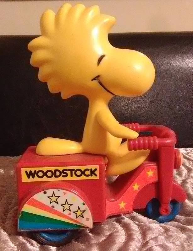 lot 7433 image: I Didnt Know WOODSTOCK on a Tricycle Toy