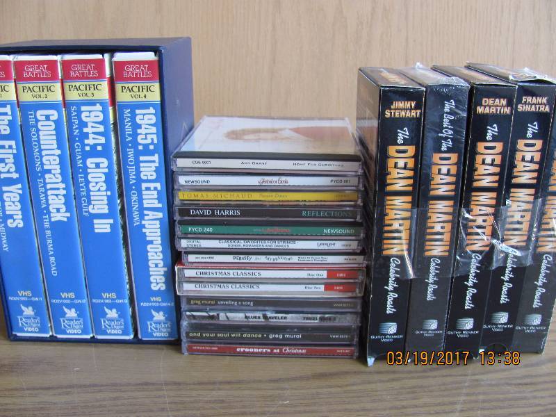 lot 6011 image: Lot of CDs  VHS Great battles of the Pacific, Dean Martin Celebrity Roasts and more