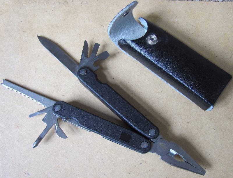 lot 6029 image: Multi-Tool with leather case