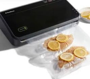 lot 44327 image: FoodSaver Vacuum Sealer System with Extra Bags and Accessories Black,