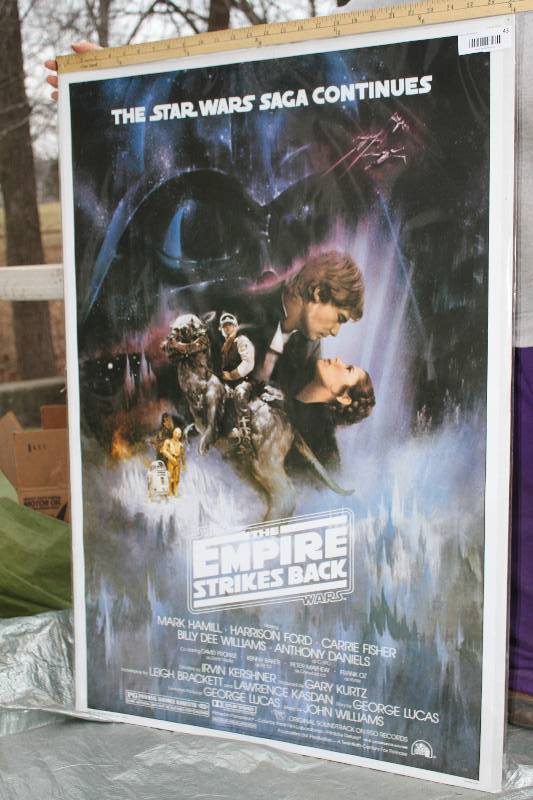 lot 42 image: Original Empire Strikes Back Poster dated 1995