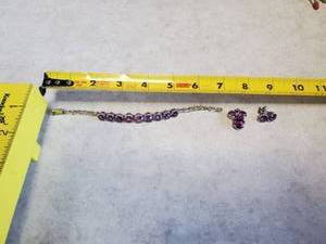 lot 54 image: Amethyst Bracelet With Matching Stud Earrings and Necklace Piece