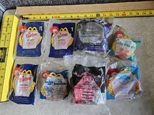 lot 70 image: Flat of Happy Meal Toys - Barbie - Recess - A Bugs Life - Peter Pan - DragonBall Z - Hamburgar