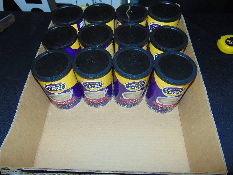 lot 1034 image: (12) Cans Oregon Chai Vanilla Latte Mix, 10 oz. Cans,