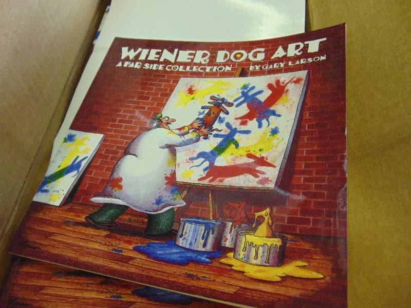 lot 1147 image: (1) case of Far Side Cartoon Books Wiener Dog Art
