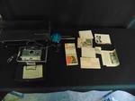 lot 1111 image: Polaroid Automatic 100 land Camera w Cary-all Case Model 322