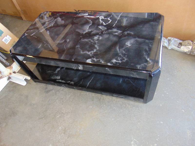 lot 1214 image: Coffee Table on Casters Resin Black Faux Marble, 42 x 22 x 15