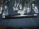 lot 1173 image: (17) ct lot Mueller 34 x 9-12 steel pipe nipples, Black