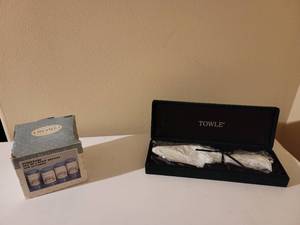 lot 151 image: Towle Spreader and 4pc Stoneware Spice Bottles.