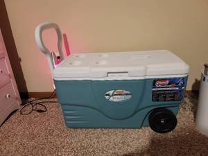 lot 180 image: Coleman Xtreme 6 Wheeled Cooler.