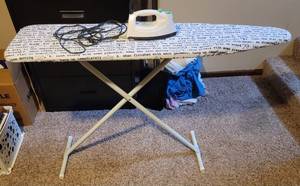 lot 198 image: Iron and Ironing Board.
