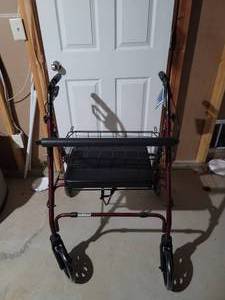 lot 219 image: NEW Go-Lite Rollator with Basket.