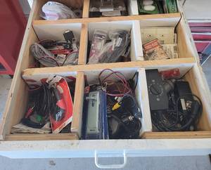 lot 296 image: Hardware, Replacement Bulbs, Audio Cable, Wall Biter and more.