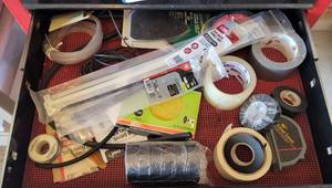 lot 318 image: Electrical Tape, Tape, Zip Ties and Sanding Pads.