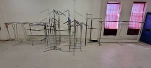 lot 13806 image: (12) Various Shape And Size Clothing Racks