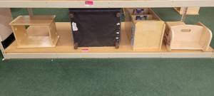 lot 13913 image: Contents of Shelf - Blue Childrens Lounge Chair, Short Kaplan Shelf, and More
