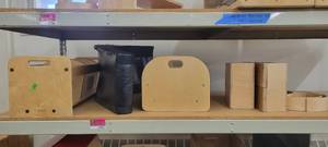 lot 13907 image: Contents of Shelf - Kaplan Organizing Bins  Crates, Black Rocker Chair, and More