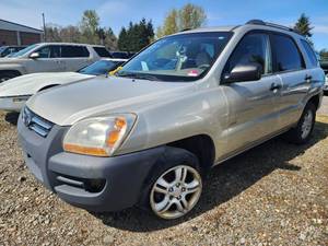 lot 2601 image: 2007 Kia Sportage LX V6 FWD, Tan