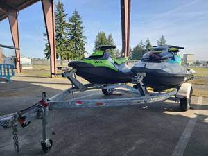 lot 2634 image: Lot Of 2 Sea Doos W Trailer