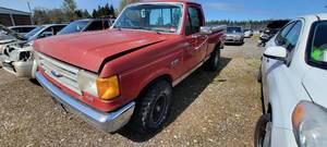 lot 2604 image: 1990 Ford F-150 Regualr Cab Pick Up Truck, Red