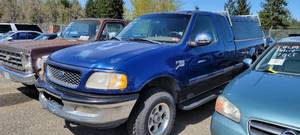 lot 2591 image: 1998 Ford F-150 Triton V8 Extended Cab Pick-Up Up Truck, Blue