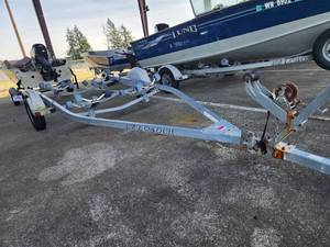 lot 2641 image: 19ft EZ Loader Galvanized Steel Boat Trailer
