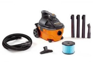 lot 1306 image: RIDGID 4 Gallon 5.0 Peak HP Portable WetDry Shop Vacuum with Fine Dust Filter, Locking Hose and Accessories, OrangesPeaches