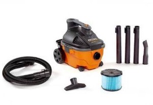 lot 6569 image: RIDGID 4 Gallon 5.0 Peak HP Portable WetDry Shop Vacuum with Fine Dust Filter, Locking Hose and Accessories, OrangesPeaches