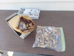 lot 6108 image: shoe box and bag of corks