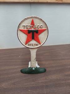 lot 6193 image: Texaco Cast Iron Doorstop