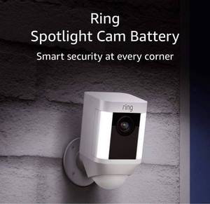 lot 2115 image: Ring Spotlight Cam Battery HD Security Camera with Built Two-Way Talk and a Siren Alarm, Works with Alexa - White Retails $189