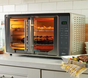 lot 2179 image: Oster XL Air Fry 10-in-1 Digital French Door Convection Oven, RED in Color, Retails--$ 260, NEW, Great Item