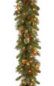 lot 2282 image: National Tree Company Pre-Lit Artificial Christmas Garland, Green, Wintry Pine, White Lights, Decorated with Pine Cones, Berry Clusters, Plug In, Christmas Collection, 9 Feet Retails $99