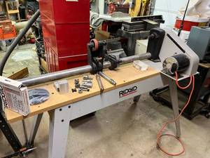 lot 1000 image: Ridgid Lathe 12 HP with table, 8pc wood turning tool set and accessories