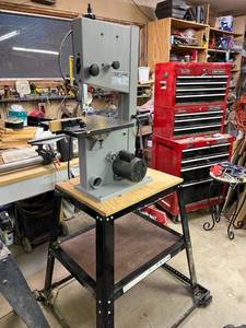 lot 1005 image: Craftsman 10 inch bandsaw on rolling locking stand