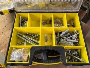 lot 1014 image: Stanley tool organizer, full of nuts and bolts