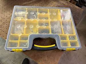 lot 1015 image: Stanley tool organizer, full of nuts and bolts