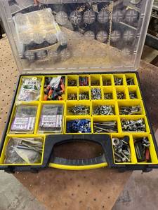 lot 1016 image: Stanley tool organizer, full of nuts and bolts