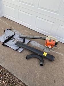 lot 1058 image: Stihl SH56C blower with attachments